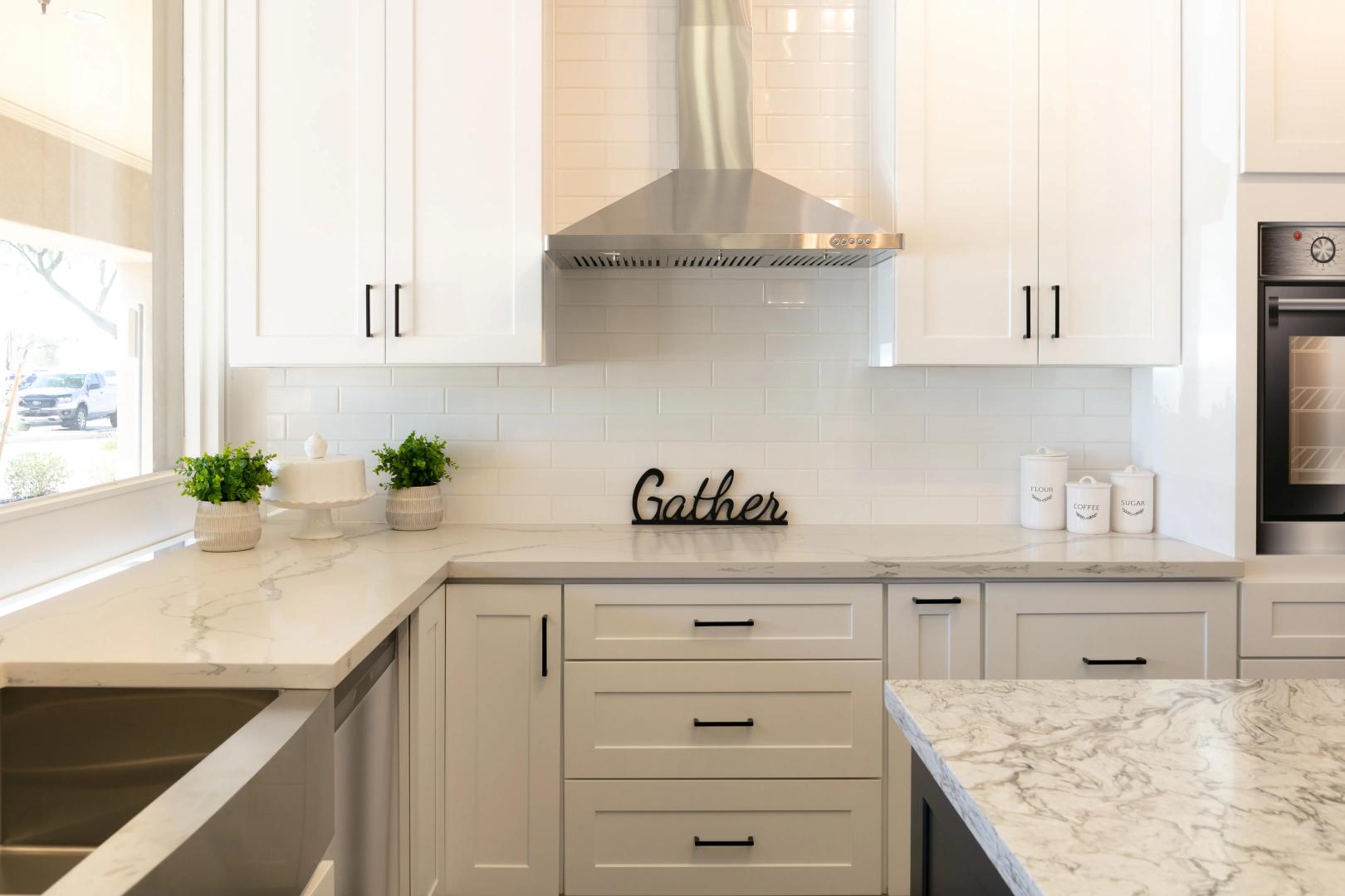 White Shaker Cabinets with Quartz Countertop